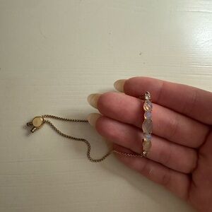Elegant Gold Bracelet with Opalescent Stones